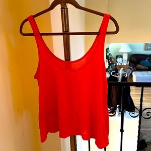 Coral( red undertones) beautiful flowy dramatic tank top with scoop neckline.